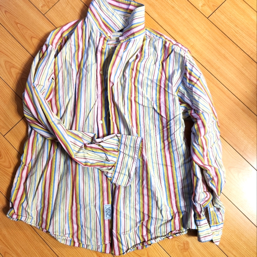 Striped button up shirt.